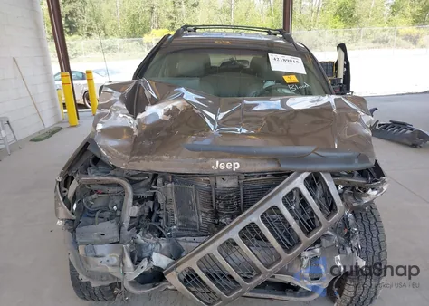 1999 Jeep Grand Cherokee Limited z USA, uszkodzony, nr VIN 1J4GW68N0XC512229